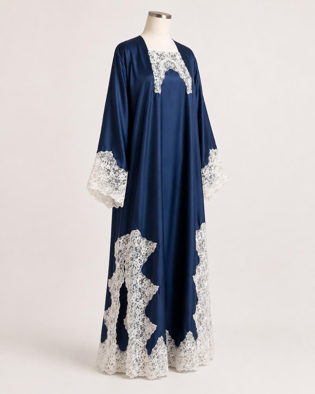 Midnight Lace Abaya on a headless mannequin, front quarter view