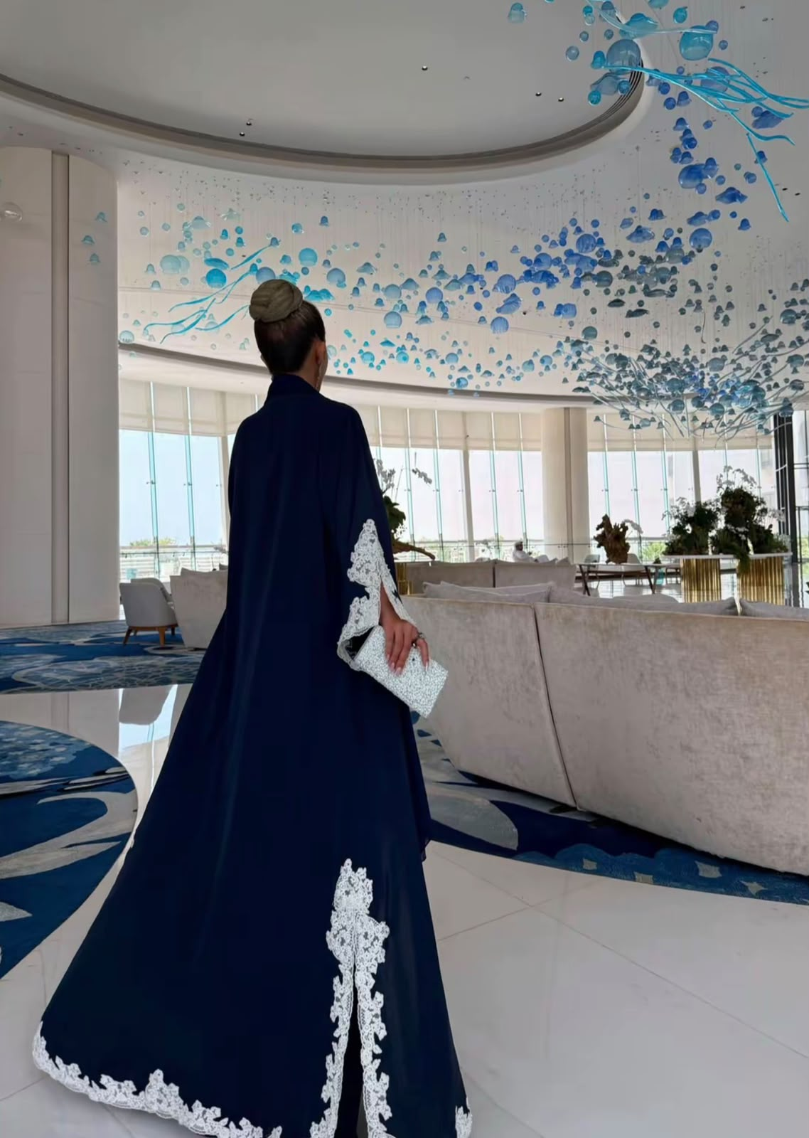 Full-length midnight blue abaya with ivory lace by Hiba Altawil